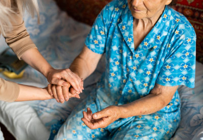Senior woman with her home caregiver