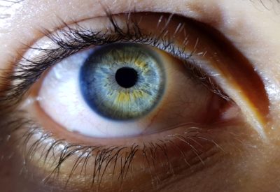 A beautiful closeup shot of a female human's deep blue eyes