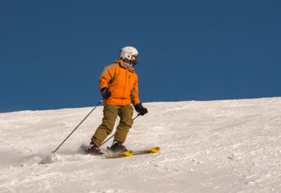 GRANDVALIRA, ANDORRA - Jan 03, 2021: Pas de la Casa, Andorra: 2021 January 03: Young man skiing in the Pyrenees at the Grandvalira ski resort in Andorra in Covid19 time